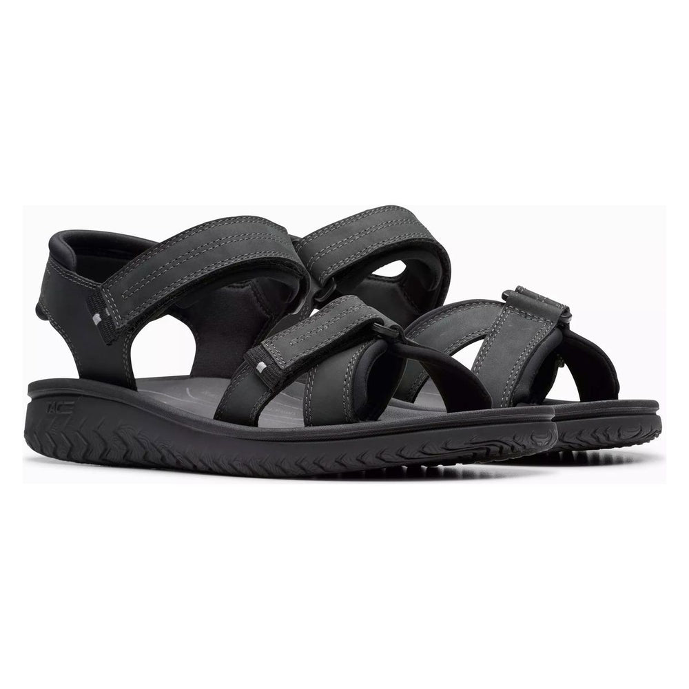 Black leather Clarks Wesley Sun sandals with adjustable straps and textured sole. 26182010.