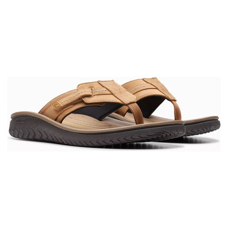 Tan leather Clarks Wesley Sun flip-flops with adjustable straps and textured sole. 26181915.