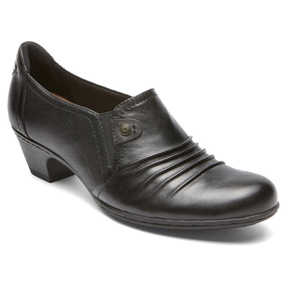 Black leather slip-on shoe with 1.5-inch block heel, ruched vamp detailing, and an antique button rivet. Style # CBD10BK.