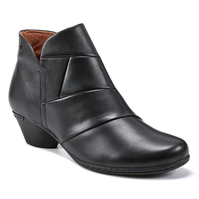 Black leather ankle bootie featuring geometric pleated details, a cone heel, and an inner side zipper. Style #CJ2626