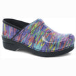Women's Dansko Professional slip-on clog in vibrant, multi-coloured abstract marker print patent leather with black rocker sole. Style #706-110202