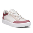 White sneaker with maroon accents on a white background. Ecco Soft 60 for women. 