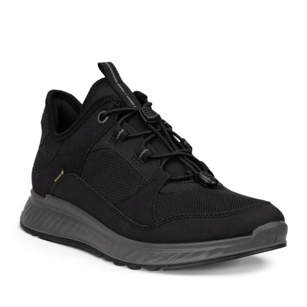 Black women's athletic sneaker with GORE-TEX logo, speed-lace closure, and a textured grey sole. Style #8353330001