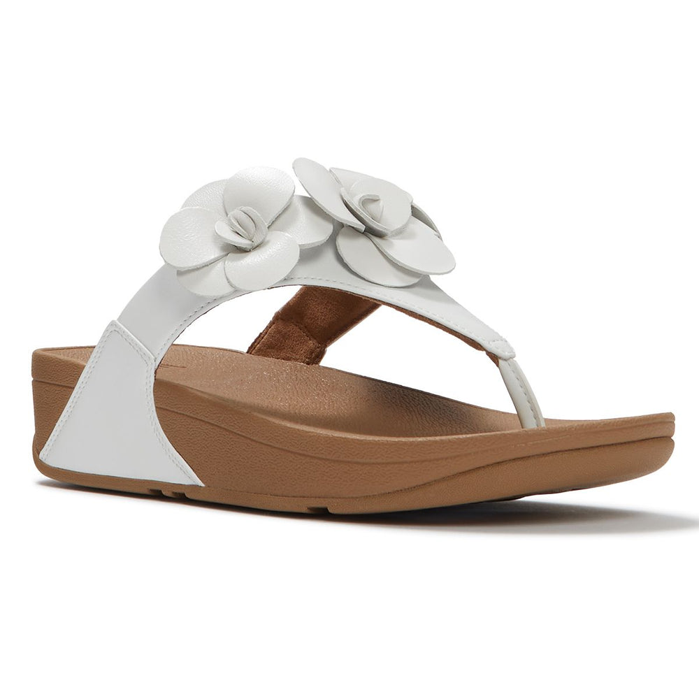 Women's white leather thong sandal with two 3D floral accents on the strap and a tan wedge midsole. Style #A4N-194