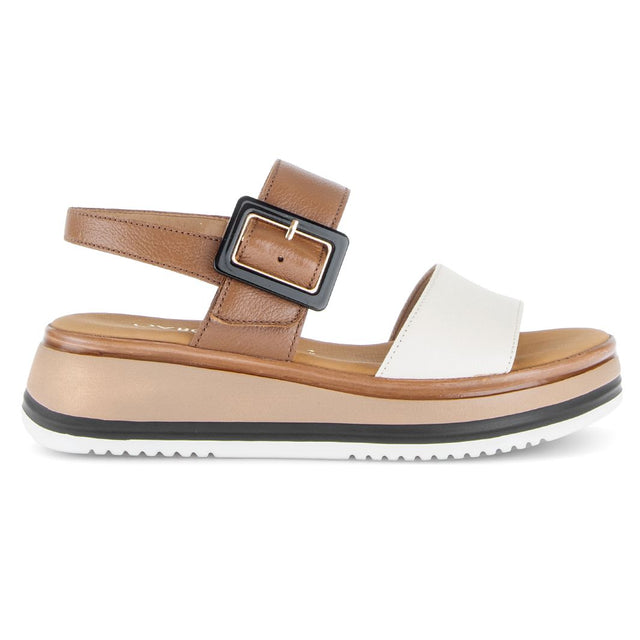 Women's camel brown and creme leather platform sandal with a large black buckle and striped rubber sole. Style #744.52