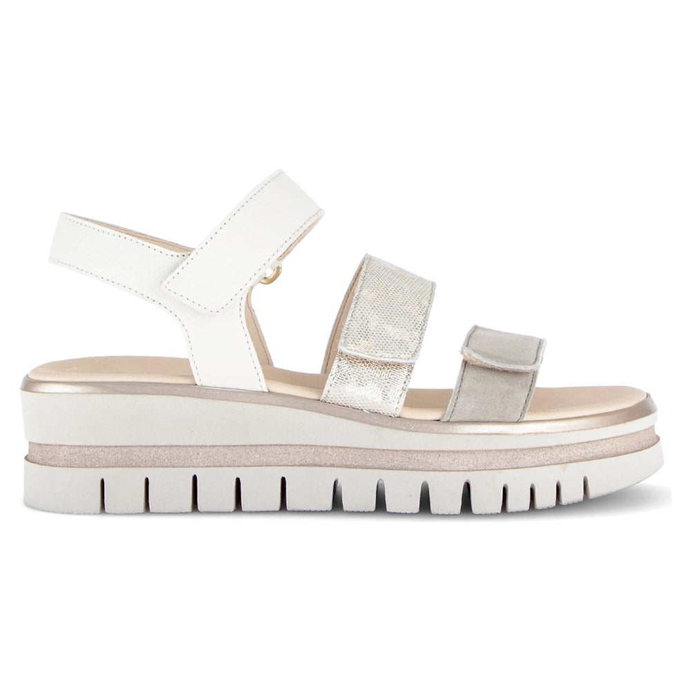 Women’s grey and silver platform sandal with adjustable velcro straps, metallic accents, and a thick white lug sole. Style #84.620.69
