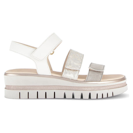 Women’s grey and silver platform sandal with adjustable velcro straps, metallic accents, and a thick white lug sole. Style #84.620.69