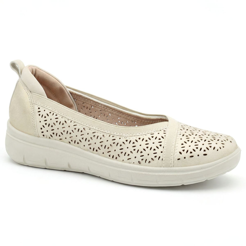 Women's beige slip-on shoe with laser-cut floral patterns, a padded collar, and a thick off-white wedge sole. Style #S8486.