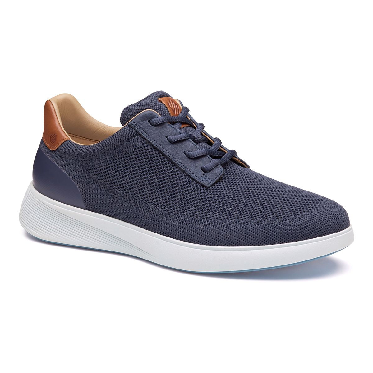 Mens navy knit lace-up sneaker with a brown leather heel tab and a thick white rubber sole. Style #02503134