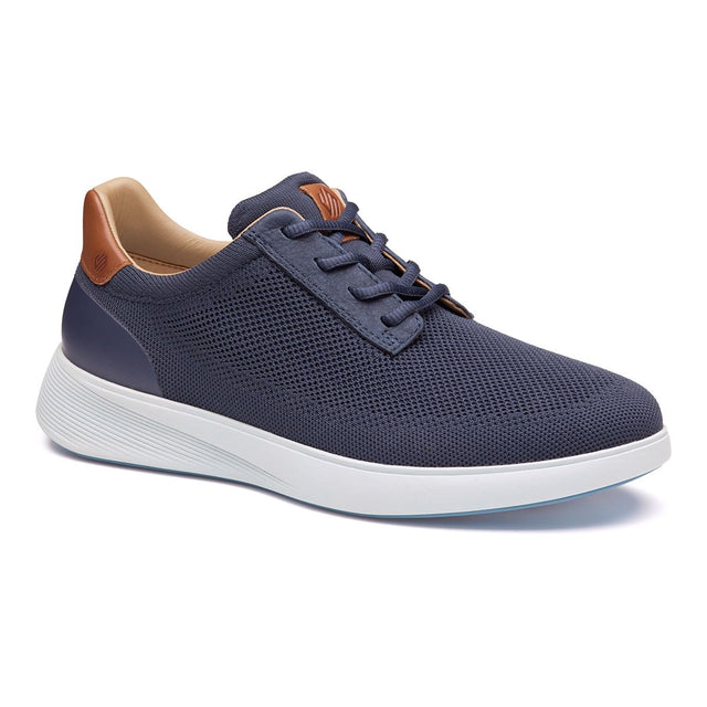Mens navy knit lace-up sneaker with a brown leather heel tab and a thick white rubber sole. Style #02503134