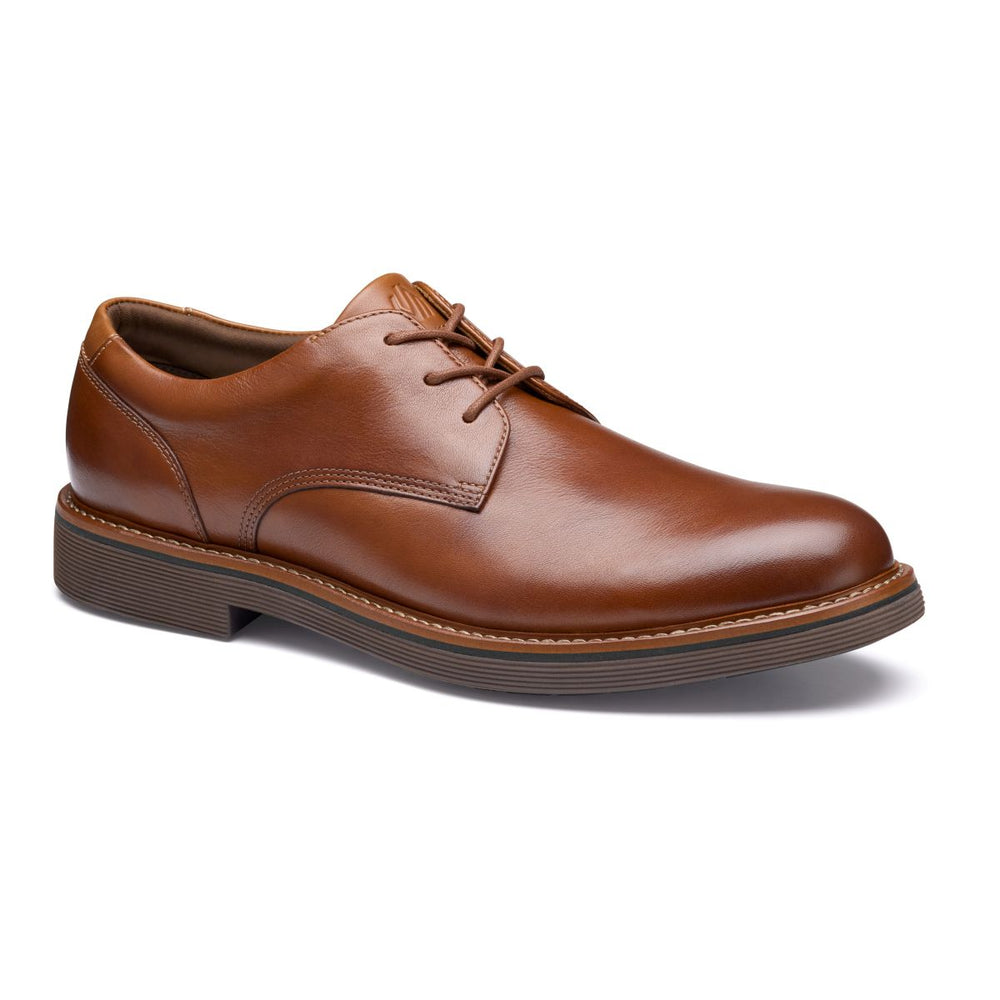 Johnston & Murphy tan leather men's plain-toe derby shoe with lace-up closure and contrast welt stitching. Style #20-4754.