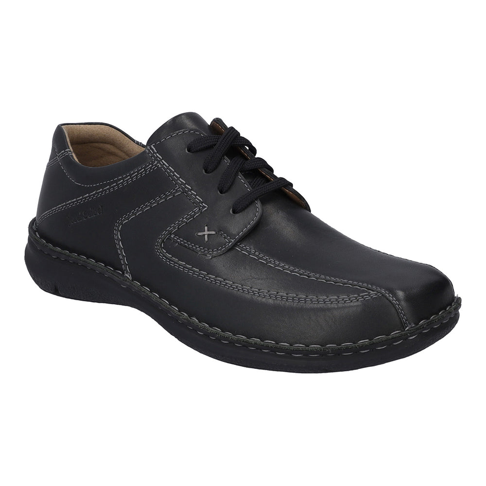 Men’s black leather shoe with wide fit, adjustable Velcro strap, rounded toe, and removable insole. Designed for daily comfort, support, and easy wearability. Style #43360-600