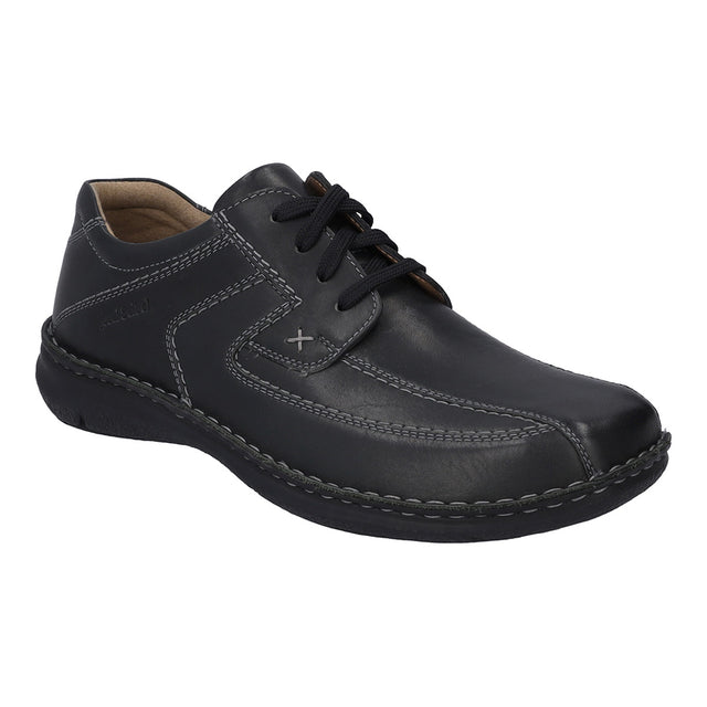 Men’s black leather shoe with wide fit, adjustable Velcro strap, rounded toe, and removable insole. Designed for daily comfort, support, and easy wearability. Style #43360-600