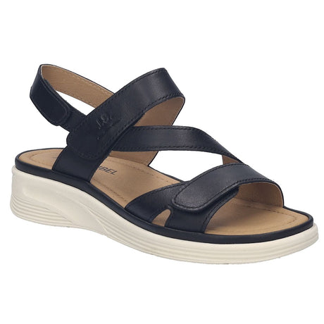 Black leather women's strappy wedge sandal with adjustable Velcro closures and a white wavy platform sole. Style #76405-5100