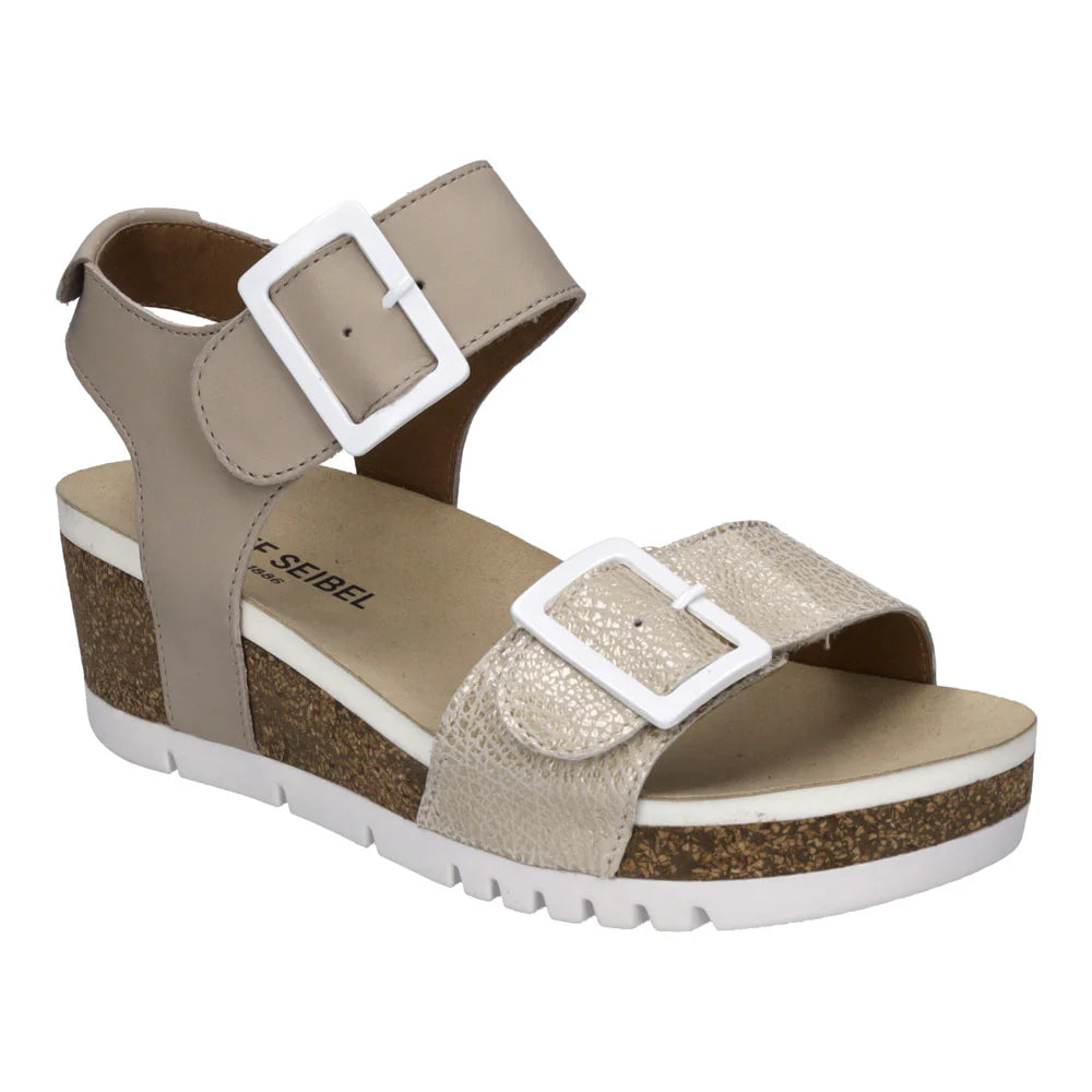 Cream-colored leather wedge sandal with two wide adjustable straps, padded footbed, and cork-textured midsole. Designed for breathable support and casual summer wear. Style #83502_231