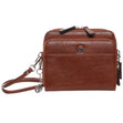 La Diva cognac brown structured crossbody handbag with top dual zippers, front logo emblem, and metal key charm. Style #5250STL
