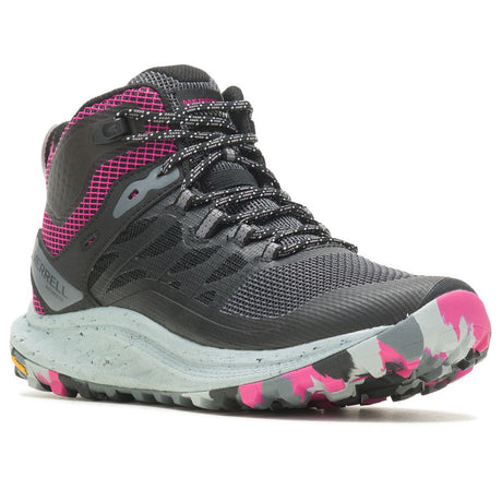 Women’s black and pink waterproof mid-zip hiking boot with a speckled grey midsole and lugged sole. Style #J067582
