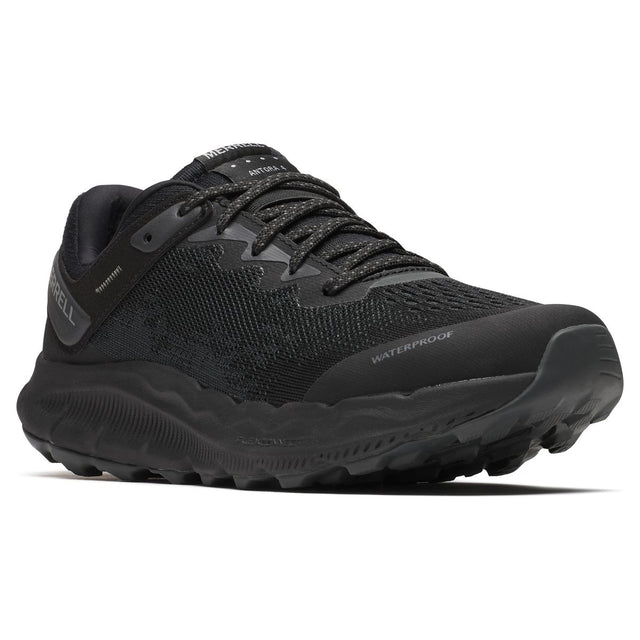 Women's black waterproof trail running shoe with durable mesh upper and rugged traction outsole. Style #J068442