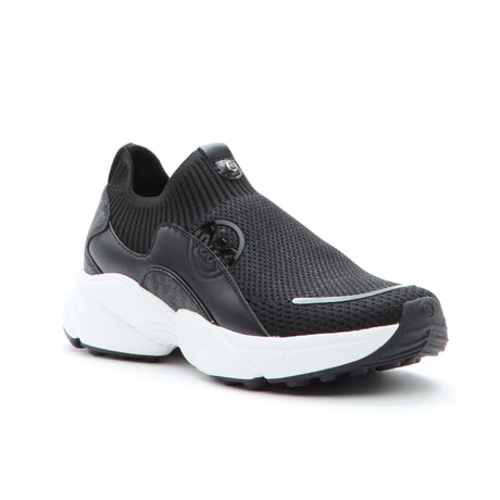A single black Michael Kors Sami Knit Sneaker with a textured knit upper, leather accents, and a white sole. 43S5SMFS1D.