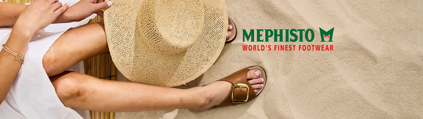 Person wearing sandals and a hat with Mephisto logo on a beige background