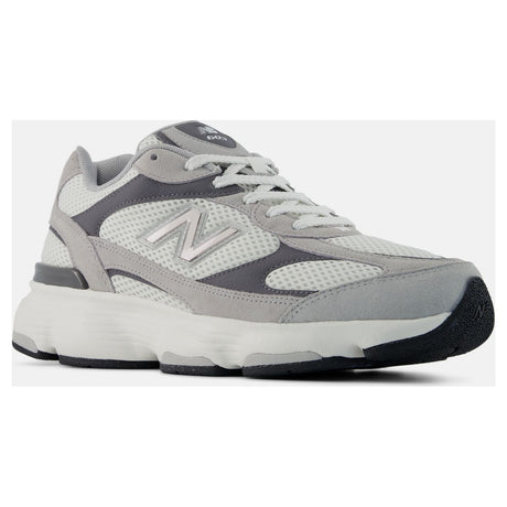 Men's grey and white mesh low-top walking sneaker with a silver side logo, white laces, and a thick white sole. Style #M6032OD.