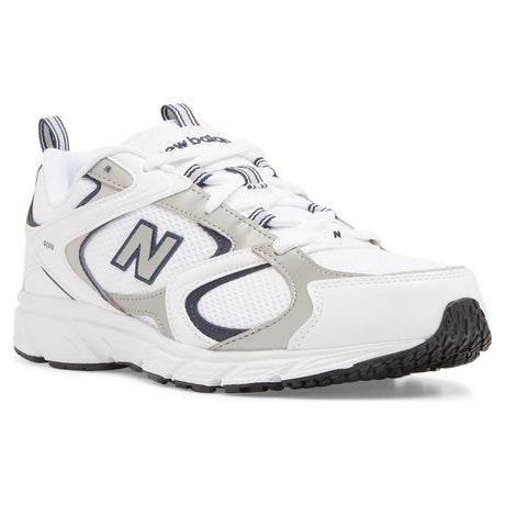 Men's white mesh training sneaker with indigo and grey overlays, white laces, and a thick white sole. Style #ML408A.