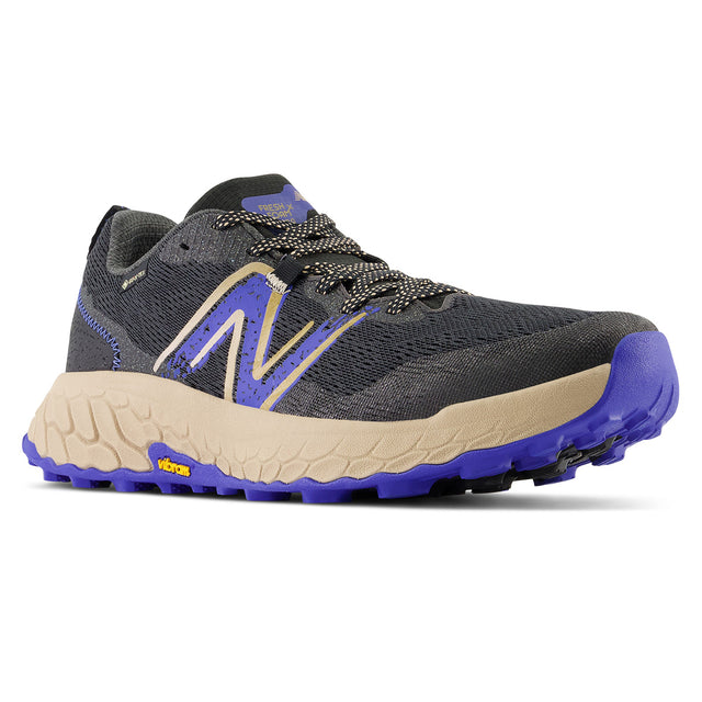 New Balance Men's Fresh Foam X Hierro v7 GORE-TEX in dark grey, purple, and tan. MTHIGK7