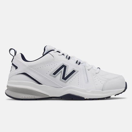 Men's New Balance MX608v5 walking shoe in white leather with navy blue collar and silver logo, featuring a visible ABZORB heel. Style #: MX608WN5