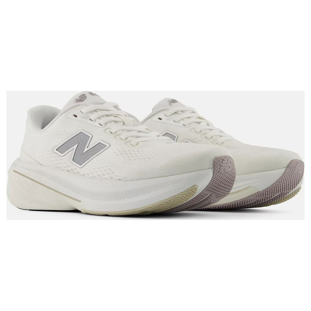 Women's white and silver lace-up runners with a large N logo and a thick cushioned Fresh Foam X midsole. Style #W86019F