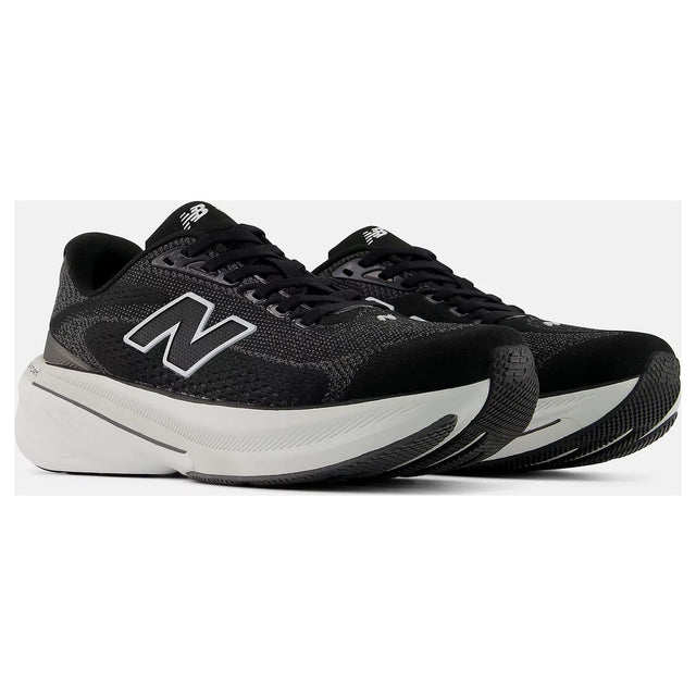 Women's black and white lace-up running shoes with a large N logo and a thick cushioned Fresh Foam X midsole. Style #W8604NE