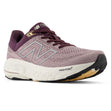 New Balance Women's Fresh Foam X 860v14 running shoe in Ice Wine (purple/mauve) with white midsole, black heel, and tan outsole. Style #: W860J14