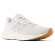 Women's white athletic sneaker with grey logo, thick white Fresh Foam midsole, and gum rubber sole. Style #WARISEG4
