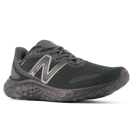 Dark grey/black New Balance Fresh Foam Arishi v4 GORE-TEX mesh running shoe with reflective logo and speckled sole. Style #: WARISGB4