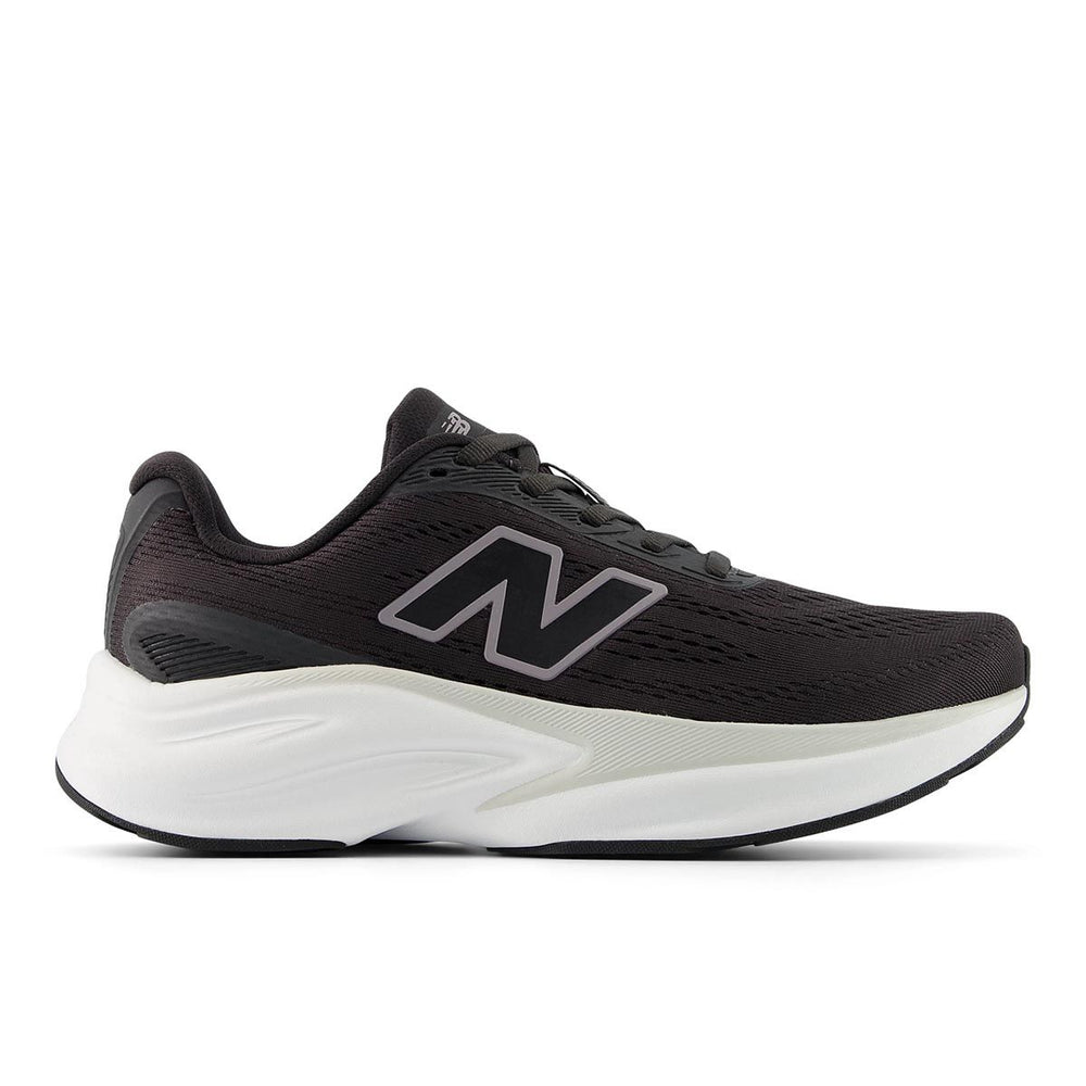 All-black women's running shoe with grey logo, oversized white Fresh Foam X midsole, and black sole. Style #WKAIR4LY