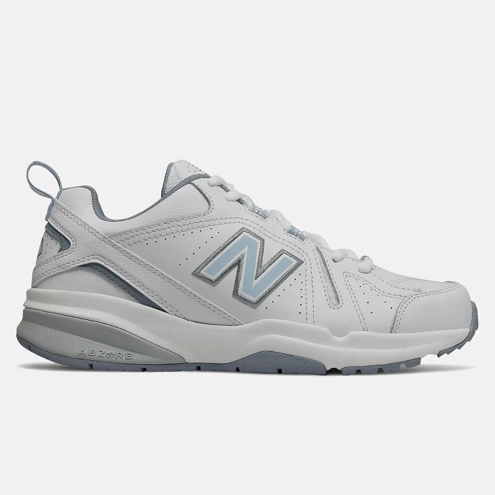 New Balance Women's WX608v5 white leather cross-trainer shoe with light blue 'N' logo and grey ABZORB midsole. Style # WX608WB5.