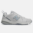 New Balance Women's WX608v5 white leather cross-trainer shoe with light blue 'N' logo and grey ABZORB midsole. Style # WX608WB5.