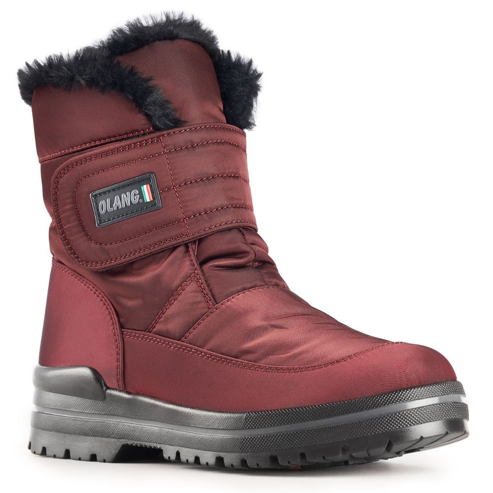 Mid-calf uva purple quilted winter boot with a Velcro strap, black faux-fur trim, and a rugged cleated sole.