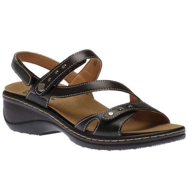 Women's black leather multi-strap wedge sandal with metal stud details, a tan footbed, and a contoured black sole. Style #S8010.