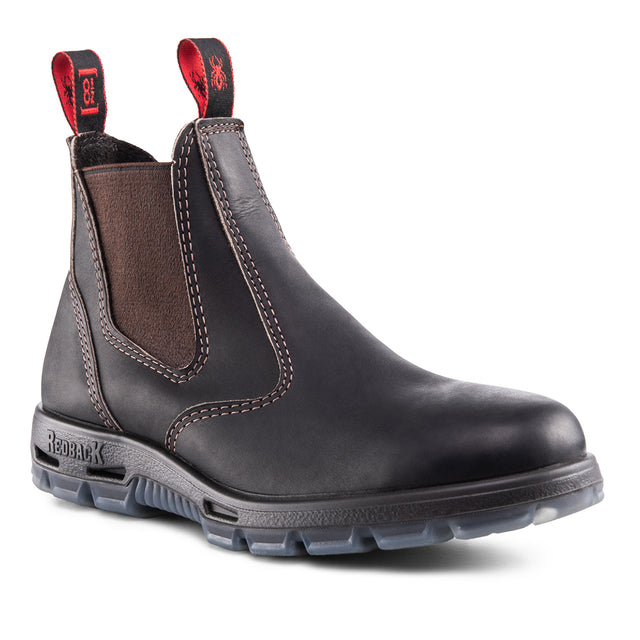 Redback Bobcat Claret Oil Kip dark brown leather slip-on work boot with elastic sides, lugged TPU sole, and red pull tabs. Style # UBOK.