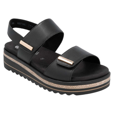 Women’s black leather sandal with two adjustable straps, gold accents, and a white platform lug sole. Style #D0Q59-00