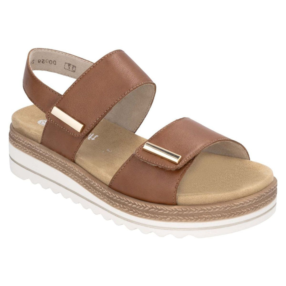 Women’s brown leather sandal with two adjustable straps, gold accents, and a white platform lug sole. Style #D0Q59-24