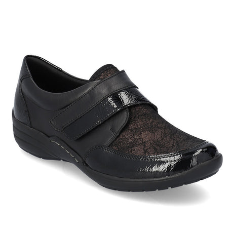 Women’s black leather slip-on shoe with floral metallic vamp, patent accents, and velcro strap. Style #R7600-03
