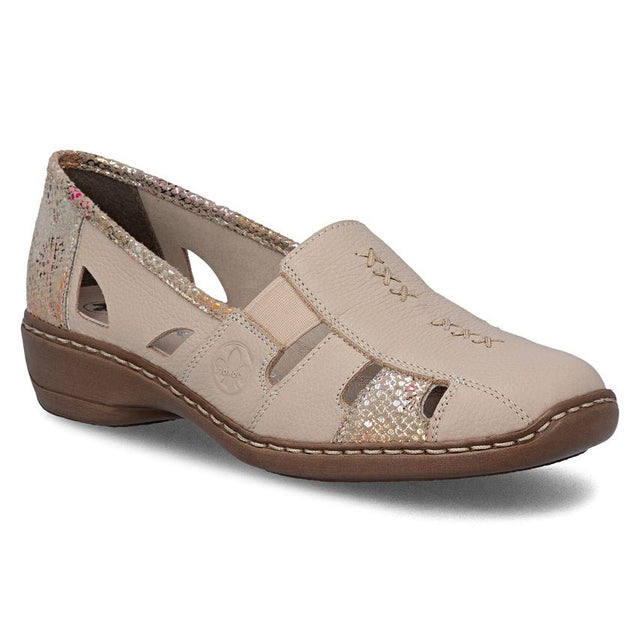 Beige leather women's slip-on with cut-outs, metallic accents, and cross-stitch details. Style #41385-63