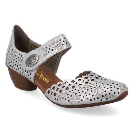 Woman's summer shoe Rieker style 43753-90 in silver. Features a low heel and the upper has delicate cut outs.