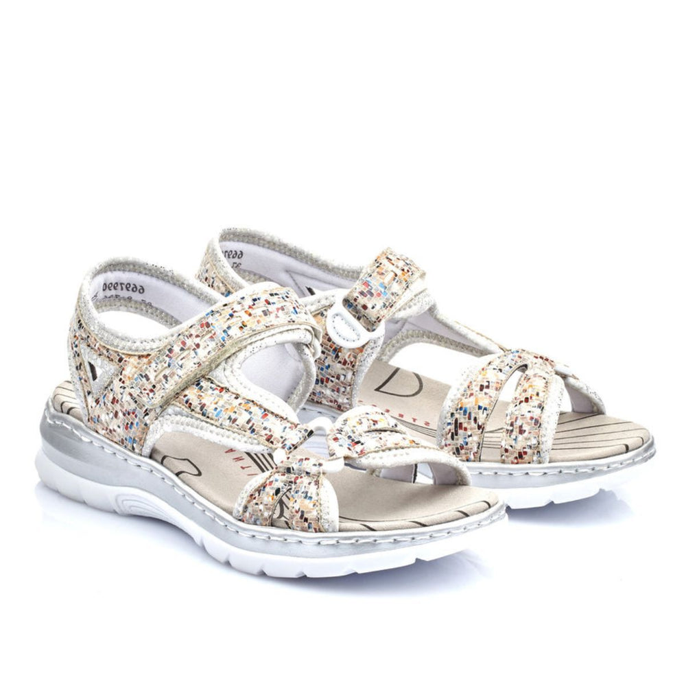 Rieker women's sandal in multicolour pebble pattern with Velcro strap, cushioned Antistress footbed, and flexible low heel rubber sole. Style #66979-90
