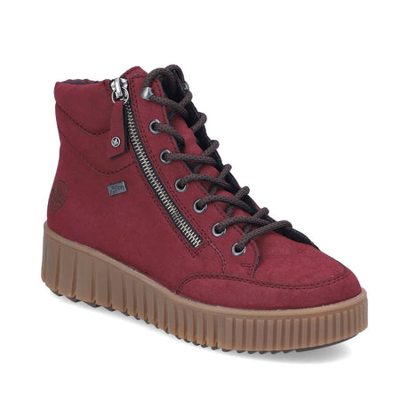 Rieker Y6104-35 red suede high-top boot with brown laces, side zipper, and a thick brown anti-stress lug sole.