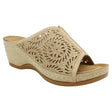 Women’s bronze slide sandal with a laser-cut pattern, glittery finish, and a comfortable wedge heel. Style # S5036.