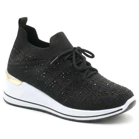 Black knit sneaker with rhinestone accents, a lace-up front, and a white wedge sole with gold detail. Style #S5479