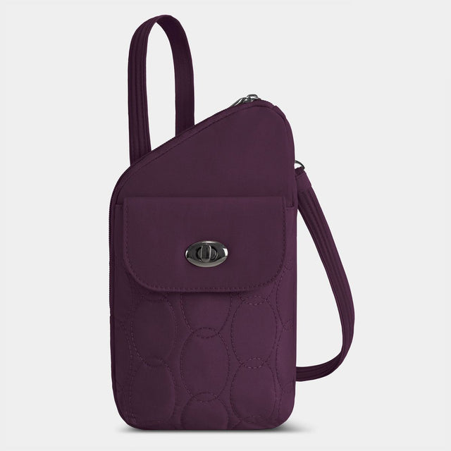 Travelon plum purple quilted slim asymmetric crossbody bag with front turn-lock flap pocket and shoulder strap. Style #43712-160