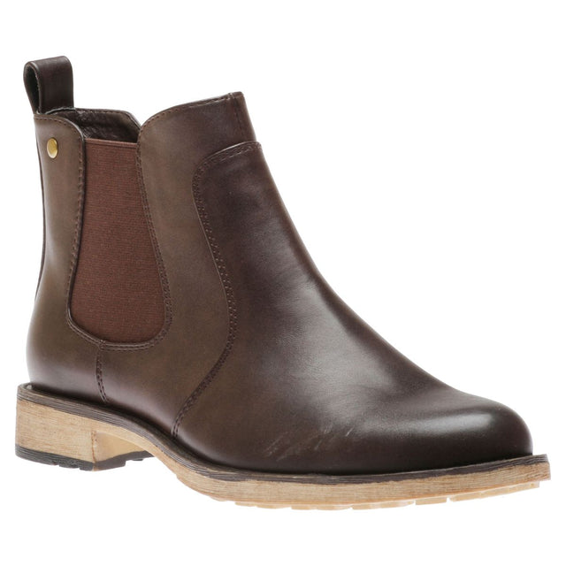 Dark brown synthetic leather Chelsea ankle boot with elastic side gussets, rear pull tab, and a low, light-coloured, textured outsole. Style # T20612-B7C